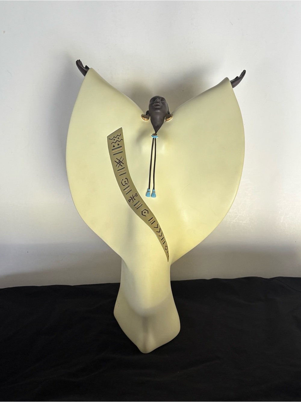 Norman Hughes "Nyame Dua" figurine from the Sankofa Collection. “JOY”